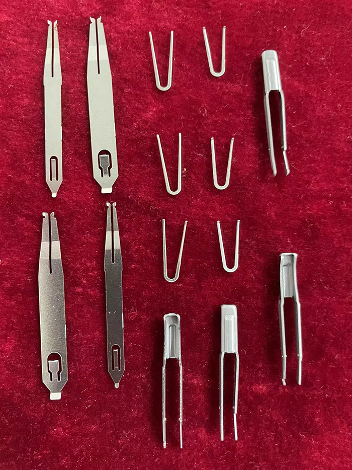 施夾鉗復位勾、連接片、鉗口